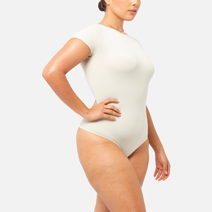 Bodysuit manga corta color Blanco Bone de costado Bone