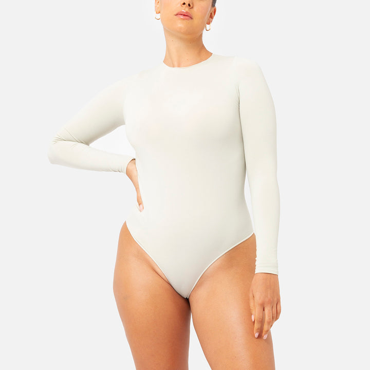 Bodysuit manga larga de color blanco modelo color Bone